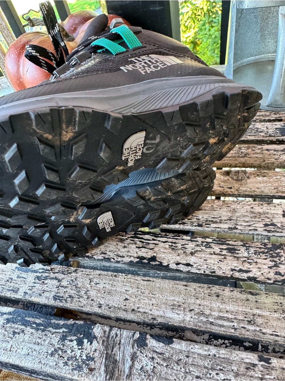 The North Face Women’s Black Trail Shoe with Teal Lace Accents worn one time.